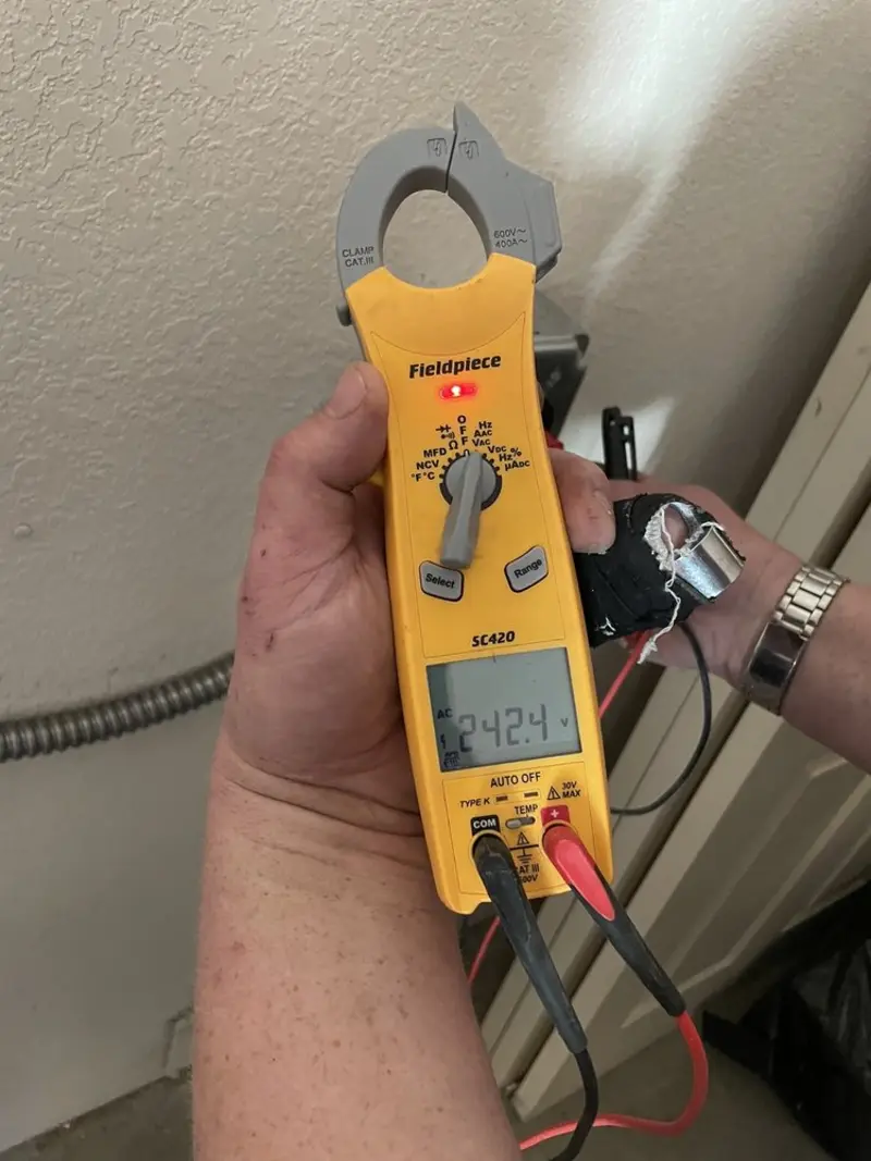 Voltage testing with clamp meter during Electrical Installation Services in Yosemite Lakes